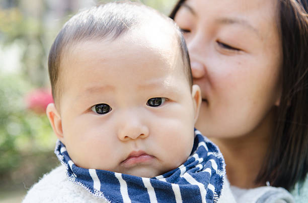 istock Young mom and her cute baby 484538285