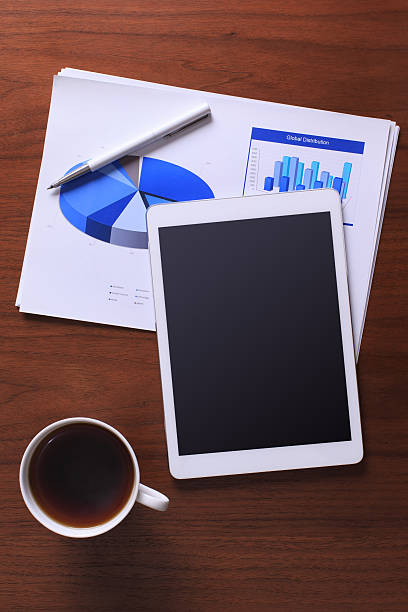 istock White screen digital tablet on business desk 484538501