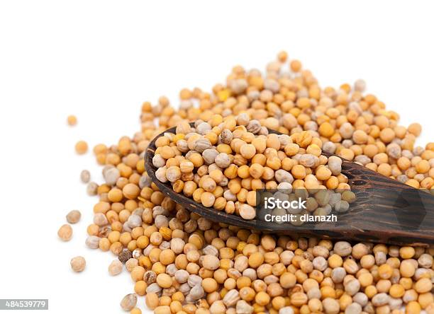 Mustard Seeds In A Wooden Spoon Stock Photo - Download Image Now - Composition, Condiment, Cut Out