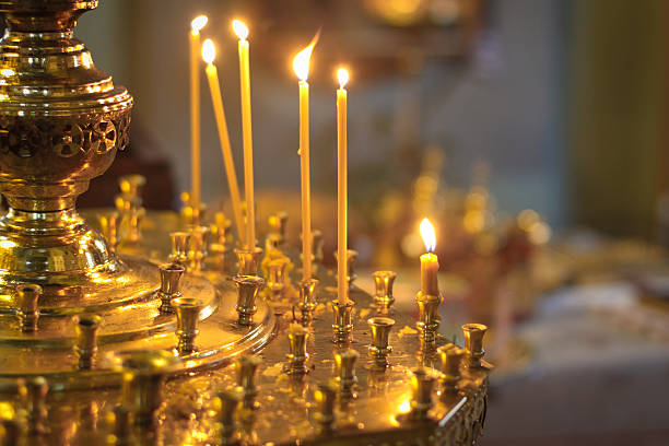 istock Burning candles in ortodox church 484540207