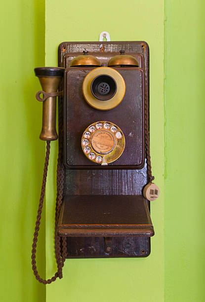 istock Antique vintage telephone green background. 484540604