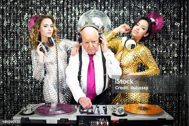 Grandpa Dj And Two Beautiful Gogo Dancers Stock Photo - Download Image Now - DJ, Senior Adult, Party - Social Event