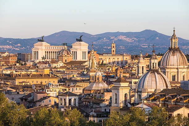 istock Roman citscape panorama at sunset in April, Rome Italy 484540943