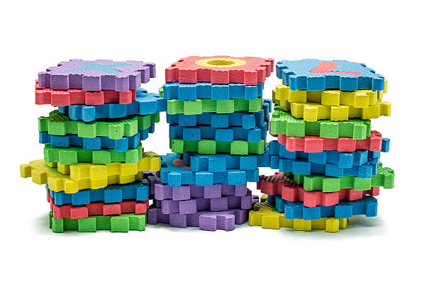 istock Tower of colorful alphabet puzzle mat 484541829