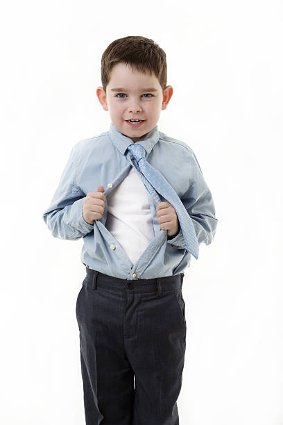 istock kid dressed up as a business person 484543361