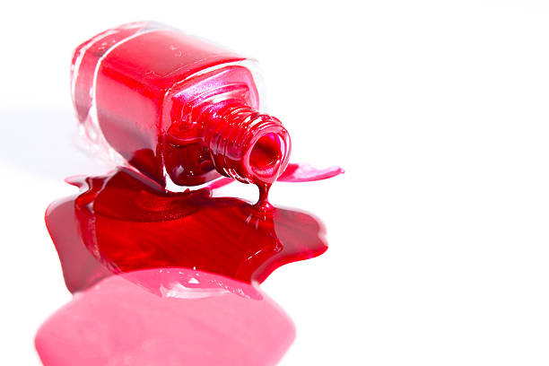 istock Red Nail Polish Closeup isolated on the white background 484544404