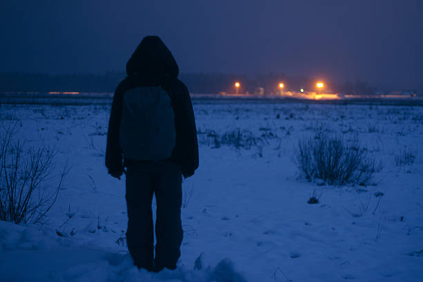 istock Lonely traveler is looking from afar at the highway 484547354