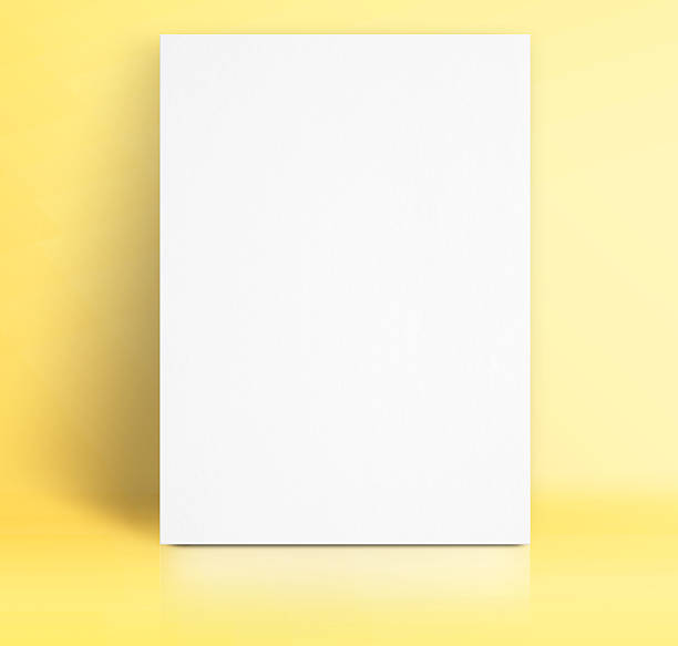 istock Black White paper poster lean at pastel yellow studio room 484547828