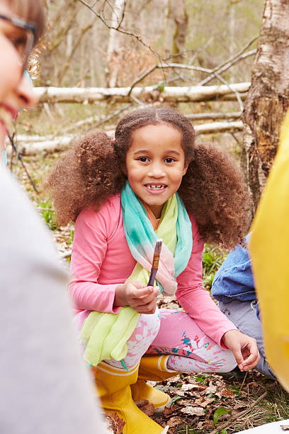 istock Girl Looking For Minibeasts At Activity Centre 484548232