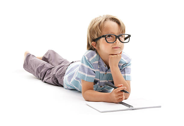 chłopiec w glab chmurą z tym zadanie domowe - child writing education nerd zdjęcia i obrazy z banku zdjęć