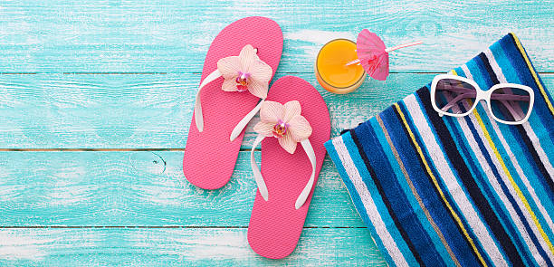 istock Summer vacation. Pink sandals by swimming pool 484552154