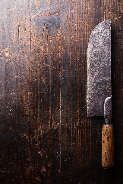 istock Meat cleaver on wooden background 484559322