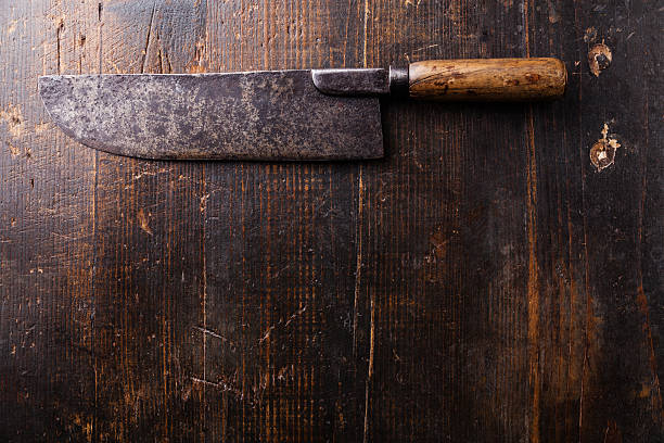 istock Meat cleaver on wooden background 484559330