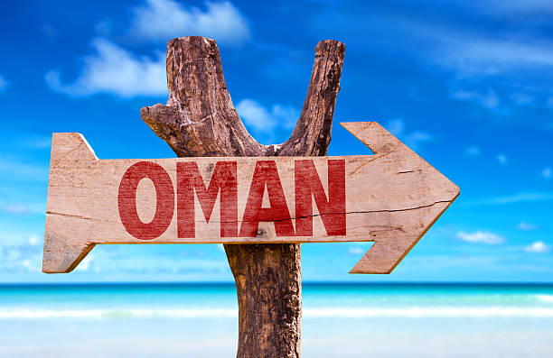 istock Oman wooden sign with beach background 484559496