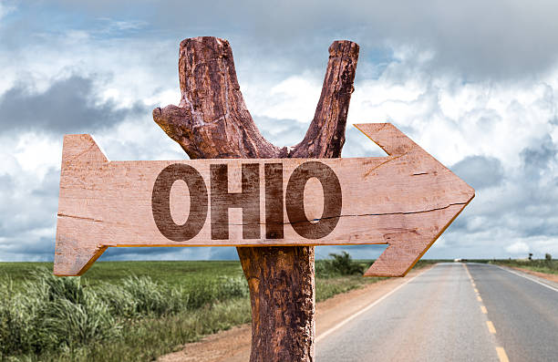 Ohio wooden sign with agriculture landscape on background Ohio wooden sign with agriculture landscape on background dayton ohio photos stock pictures, royalty-free photos & images