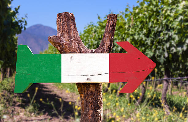 Italy Flag wooden sign with winery background Italy Flag wooden sign with winery background sardinia vineyard stock pictures, royalty-free photos & images