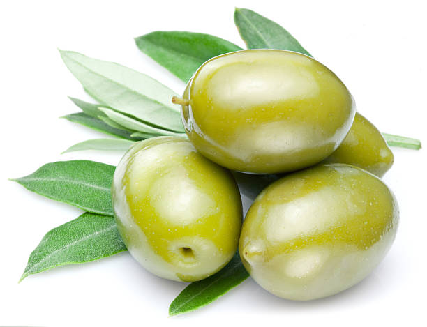 istock Two green olives with leaves 484561079