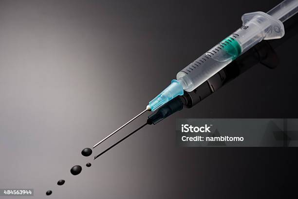Medical Syringe With Solution Drop Stock Photo - Download Image Now - 2015, Addiction, Antibiotic