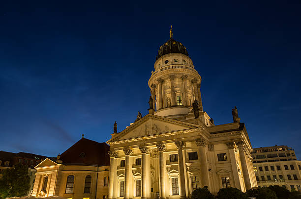istock french cathedral at the gendarmenmarkt in berlin germany night 484564308