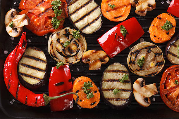 istock Background of grilled vegetables on grill horizontal top view 484565952