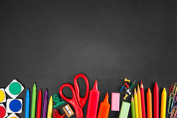 istock School Supplies on Blackboard 484569750