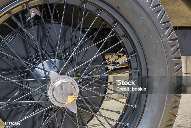 Closeup Of The Wheel Of An Old Automobile Stock Photo - Download Image Now - 2015, Antique, Black Color