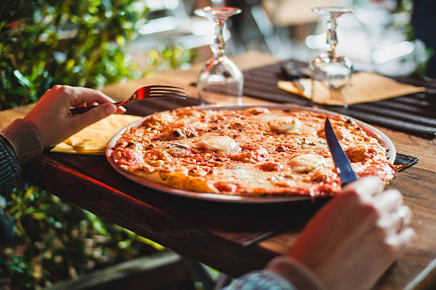 istock Cheese pizza with tomatos. In Strasbourg 484570776