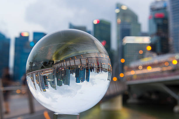 istock Crystal Ball with Reflection of Singapore CBD Skyline 484571760
