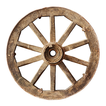 Old wooden cartwheel isolated on white