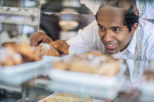 istock Man working at a pastry shop 484576214