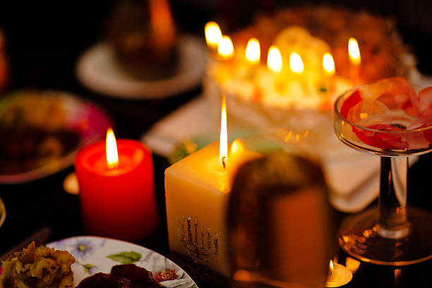 istock Burning candles on the dark wooden table 484576324