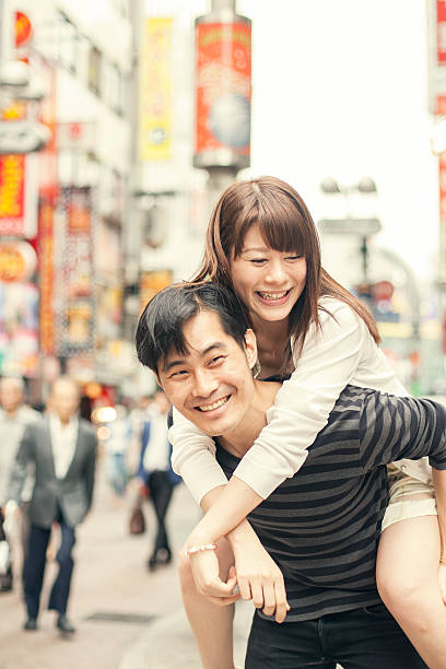 istock Young asian couple having fun 484576326