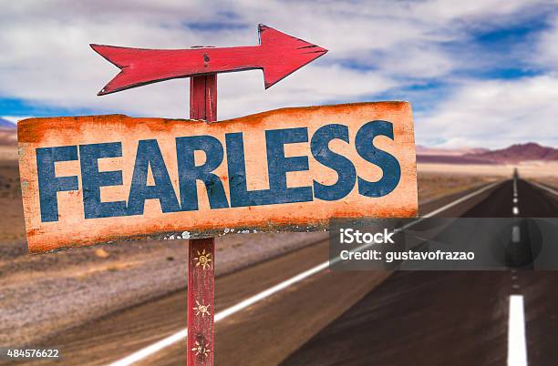 Fearless Sign With Road Background Stock Photo - Download Image Now - 2015, Adventure, Aspirations