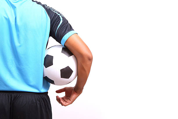istock Young soccer football player on white 484579465
