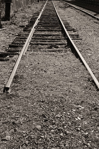 istock End of the Line - Abandoned Factory Train Tracks 484580358