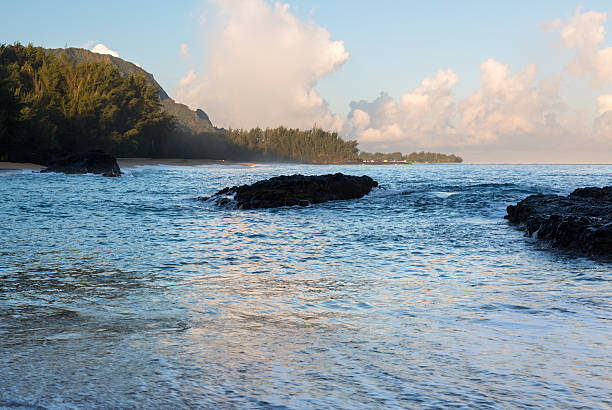 istock Lumahai Beach Kauai at dawn with rocks 484581211