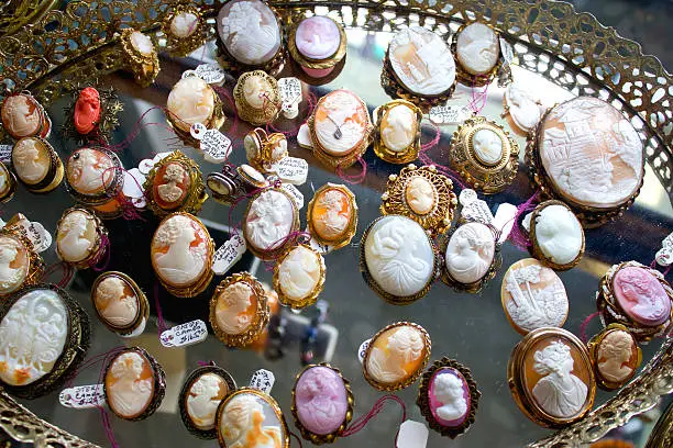 Antique Cameos for Sale - Colorful antique cameos on a mirror for sale at an Antique Shop