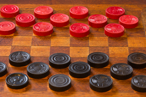 Classic Game of Checkers - Classic Game of Checkers on an Antique Wooden Board