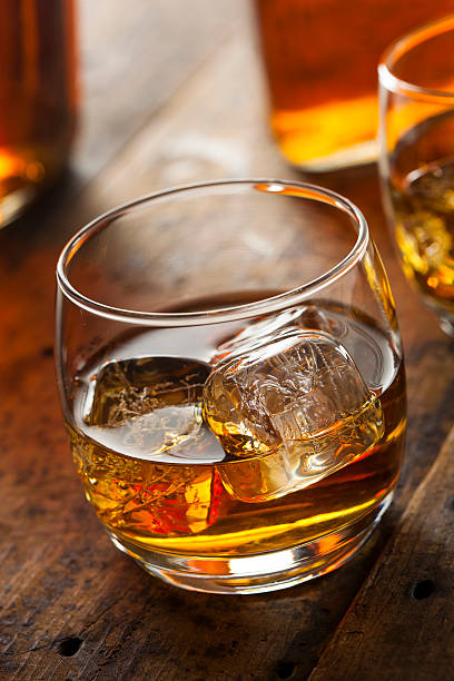 istock Alcoholic Whiskey Bourbon in a Glass with Ice 484581337