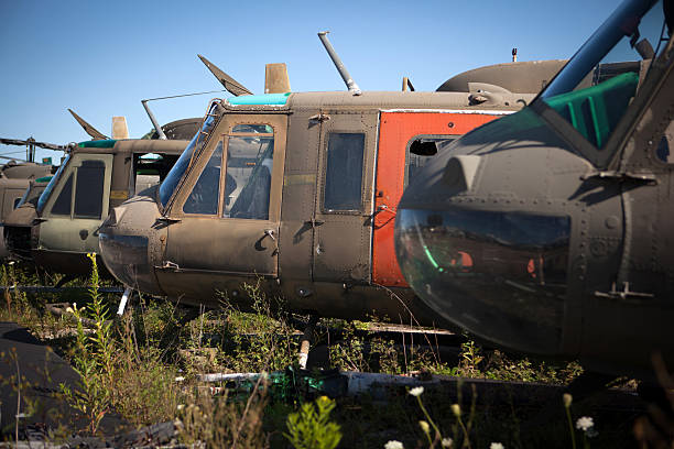 istock Retired Bell Huey helicopters at a salvage yard 484581830