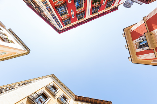 old buildings in the old town of Madrid, Spain, in a low angle view