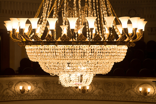 The Palace of the Parliament is the seat of the Parliament of Romania. The Palace of the Parliament is one of the heaviest buildings in the world, constructed over a period of 13 years (1984–1997). The image shows a large switched off chandelier inside the Parliament Building.