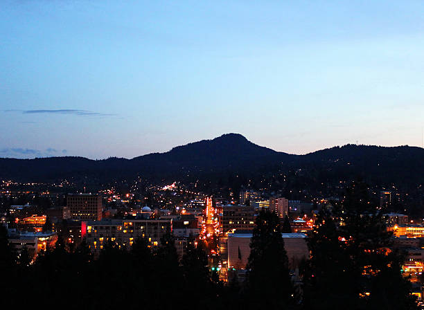 Heart Of The City Eugene Oregon at night. Centered on Willamette st.  The defining artery of the city.  eugene oregon stock pictures, royalty-free photos & images