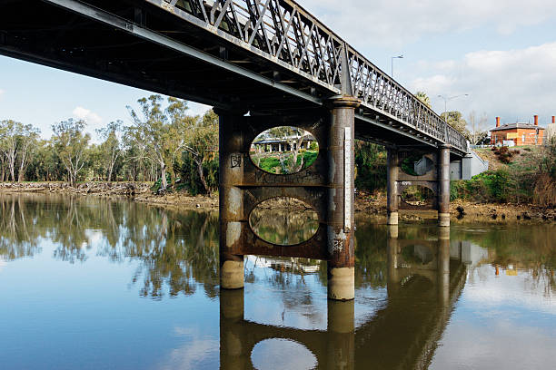 istock Old bridge Crossing River - Film look. 484584008