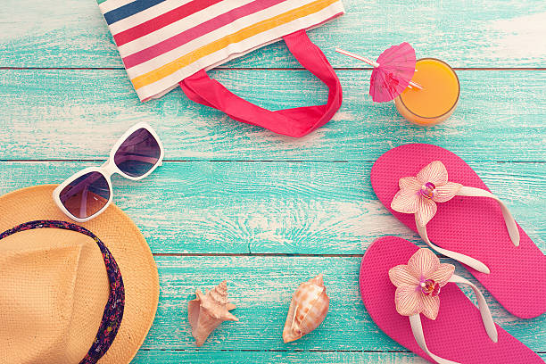 istock Summer vacation. Pink sandals by swimming pool 484587330