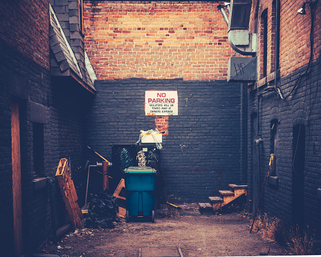 Retro Style Image Of A Grungy Urban Alley