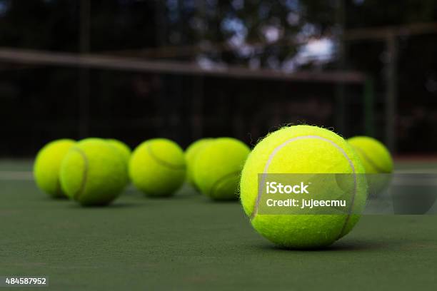 Tennis Ball On The Court Stock Photo - Download Image Now - Tennis Ball, 2015, Green Color
