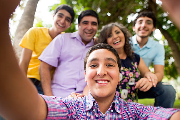 istock Happy family taking selfie 484591640