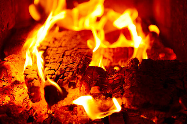 istock burning coals in the fireplace close-up 484593844