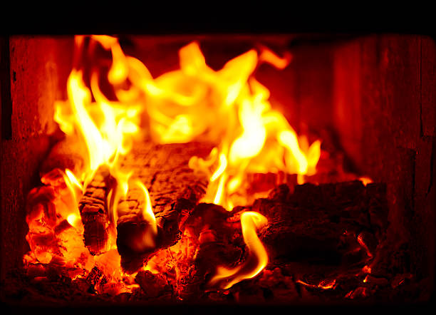 istock burning coals in the fireplace close-up 484593846